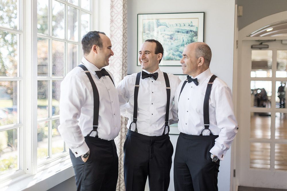 Groom Talking With His Guests

