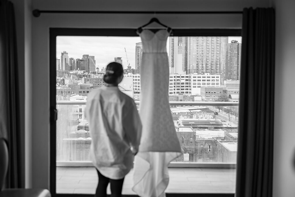 Bride Watching Her Bridal Gown
