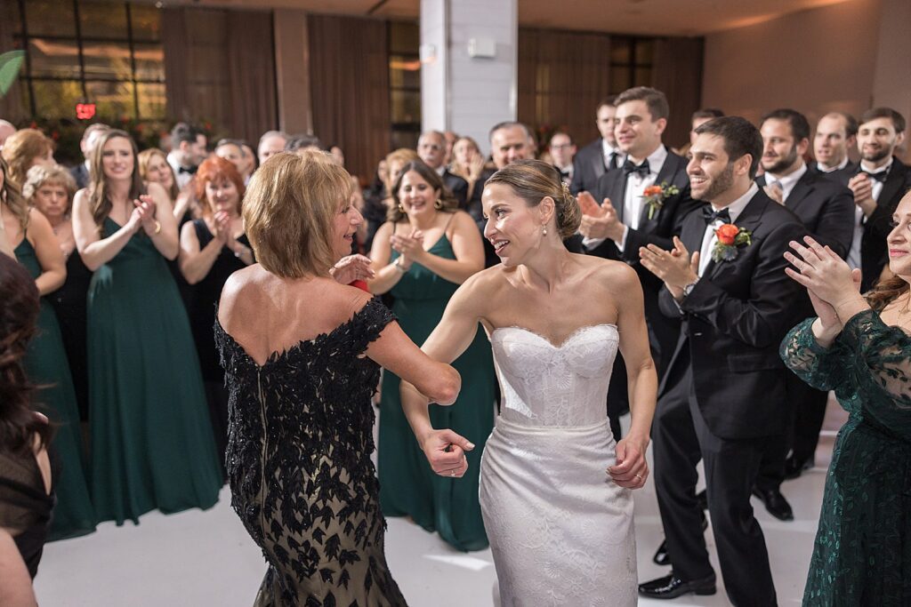 Bride Dancing With Woman
