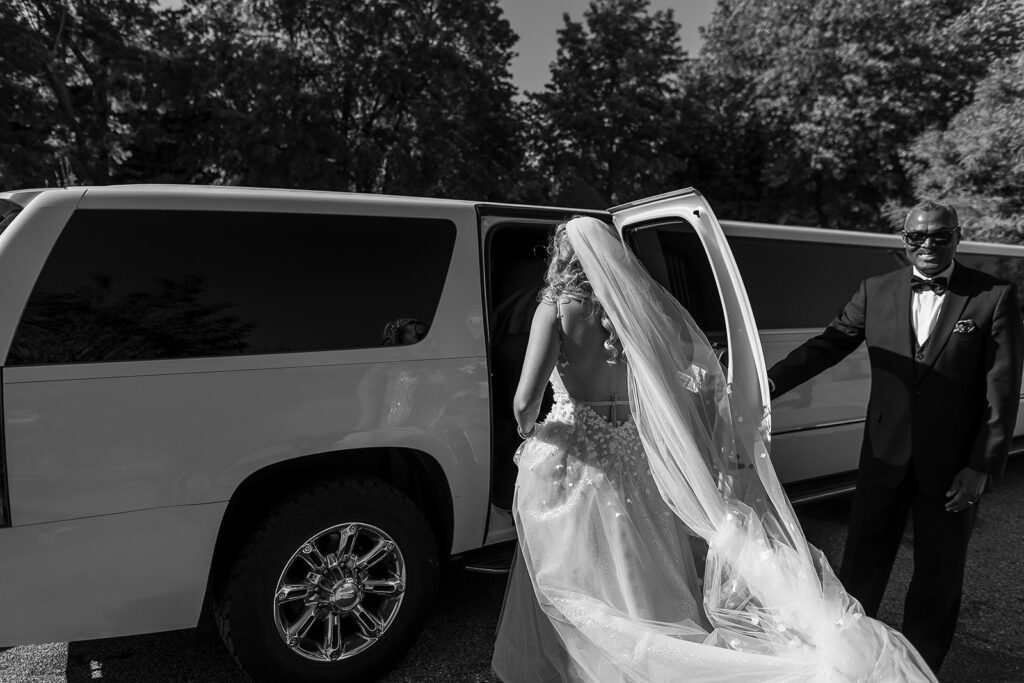 bride gets into the limo